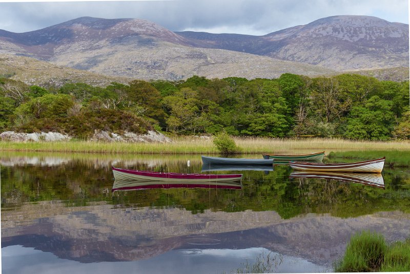 Four boats in tranquil water, Molls Gap, County Kerry.jpg